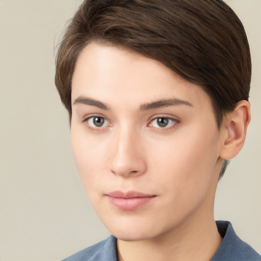 Neutral white young-adult female with short  brown hair and brown eyes