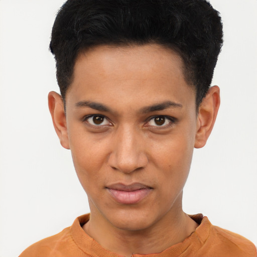 Joyful black young-adult male with short  brown hair and brown eyes