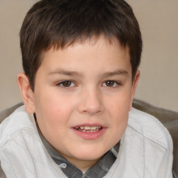 Joyful white child male with short  brown hair and brown eyes