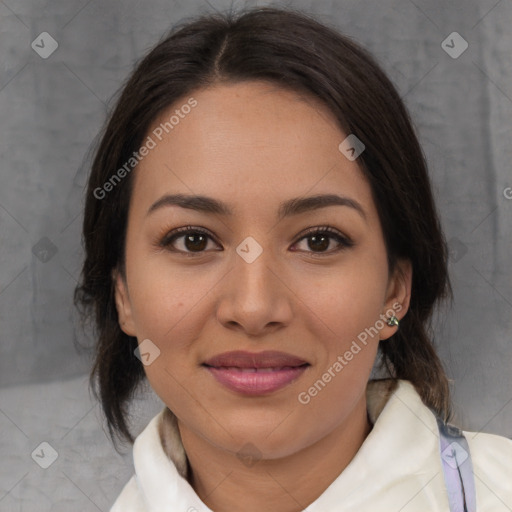 Joyful latino young-adult female with medium  brown hair and brown eyes