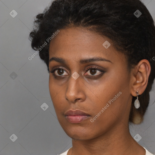 Neutral black young-adult female with short  brown hair and brown eyes