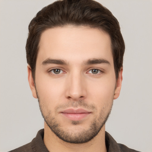 Neutral white young-adult male with short  brown hair and brown eyes