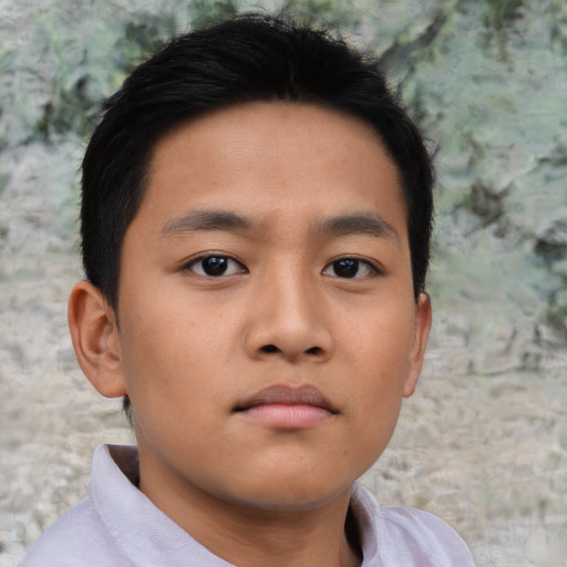 Neutral asian child male with short  brown hair and brown eyes
