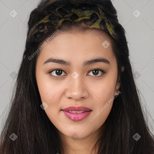 Joyful asian young-adult female with long  brown hair and brown eyes