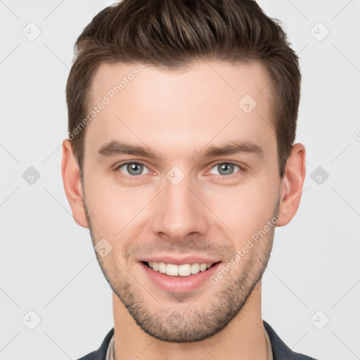 Joyful white young-adult male with short  brown hair and brown eyes