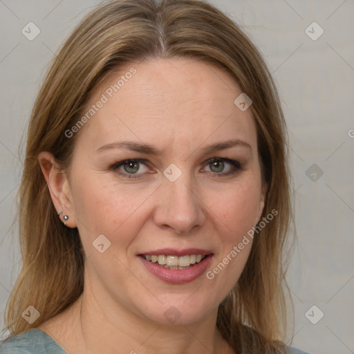 Joyful white adult female with medium  brown hair and grey eyes