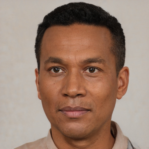 Neutral black adult male with short  black hair and brown eyes