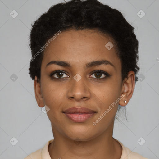 Joyful black young-adult female with short  black hair and brown eyes