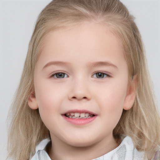 Joyful white child female with medium  brown hair and grey eyes