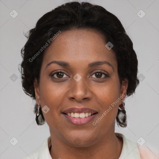 Joyful black young-adult female with short  brown hair and brown eyes