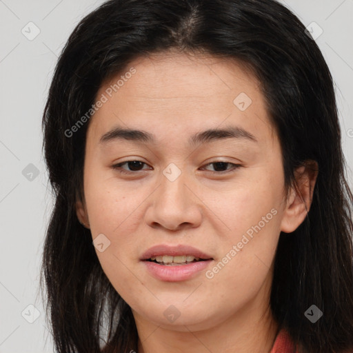 Joyful asian young-adult female with long  brown hair and brown eyes