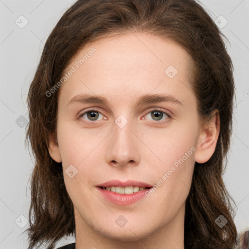 Neutral white young-adult female with long  brown hair and green eyes