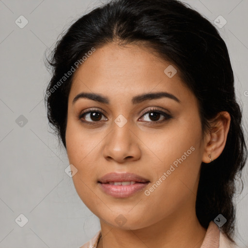 Joyful latino young-adult female with medium  brown hair and brown eyes