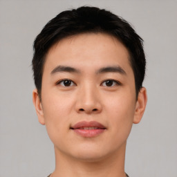 Neutral asian young-adult male with short  brown hair and brown eyes