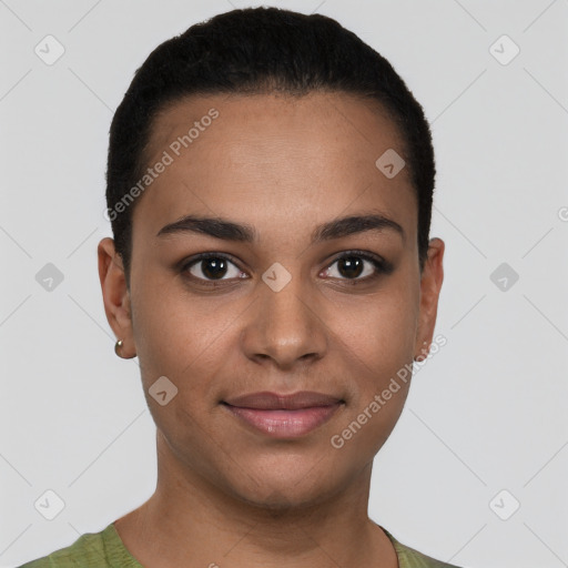 Joyful latino young-adult female with short  brown hair and brown eyes