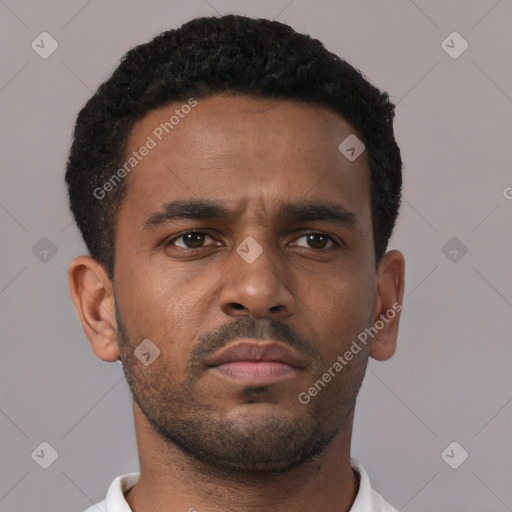 Neutral black young-adult male with short  brown hair and brown eyes