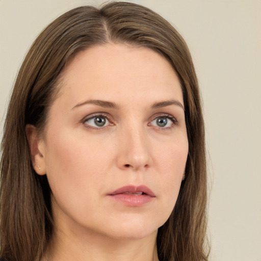 Neutral white young-adult female with long  brown hair and grey eyes