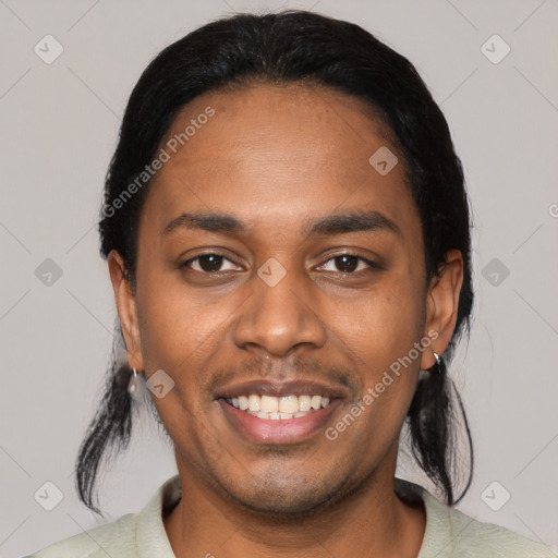 Joyful black young-adult male with short  black hair and brown eyes