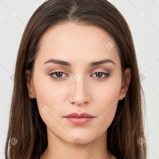 Neutral white young-adult female with long  brown hair and brown eyes