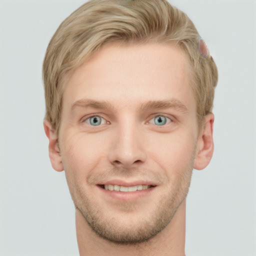 Joyful white young-adult male with short  brown hair and blue eyes