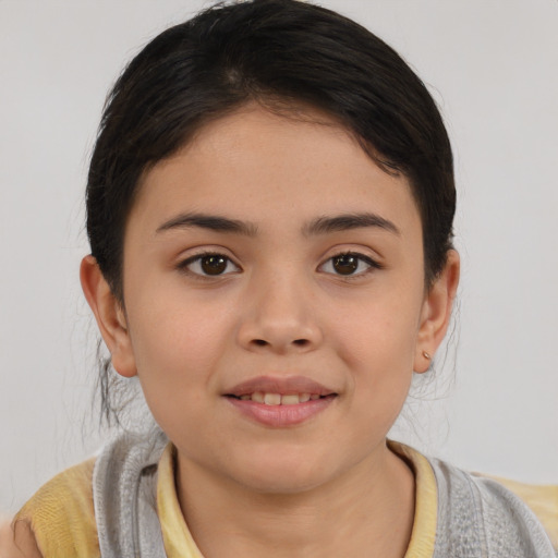 Joyful asian child female with short  brown hair and brown eyes