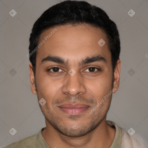 Joyful latino young-adult male with short  black hair and brown eyes