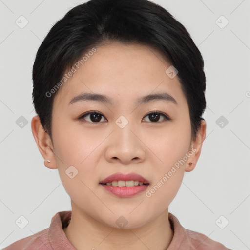 Joyful asian young-adult female with short  black hair and brown eyes