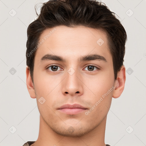 Neutral white young-adult male with short  brown hair and brown eyes