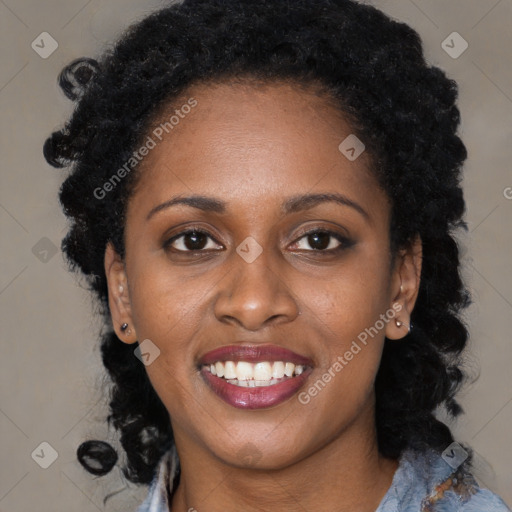 Joyful black young-adult female with medium  black hair and brown eyes