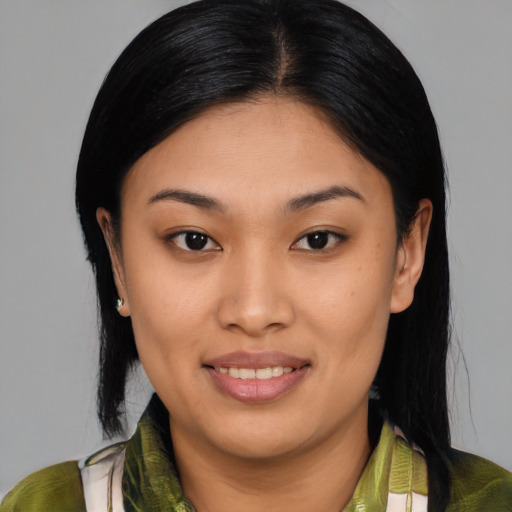Joyful asian young-adult female with medium  brown hair and brown eyes
