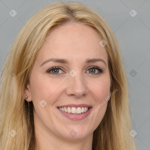 Joyful white young-adult female with long  brown hair and brown eyes