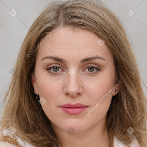 Joyful white young-adult female with long  brown hair and blue eyes