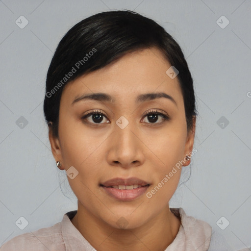 Joyful asian young-adult female with medium  black hair and brown eyes