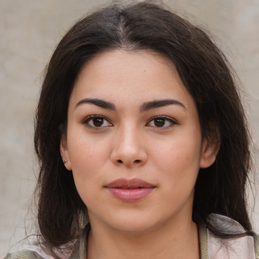 Neutral asian young-adult female with medium  brown hair and brown eyes