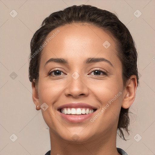 Joyful white young-adult female with long  brown hair and brown eyes