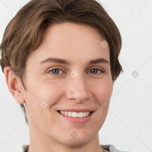 Joyful white young-adult female with short  brown hair and grey eyes