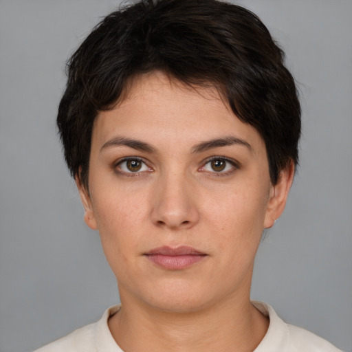 Neutral white young-adult female with short  brown hair and brown eyes