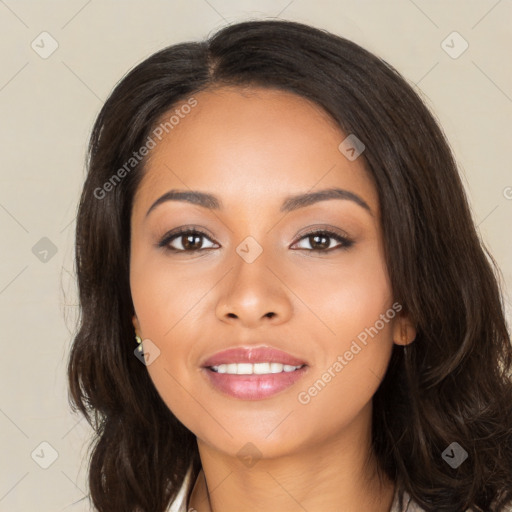 Joyful latino young-adult female with long  brown hair and brown eyes