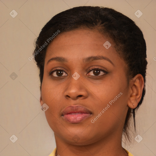 Joyful black young-adult female with medium  brown hair and brown eyes
