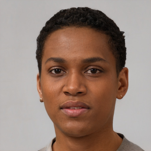 Neutral black young-adult female with short  black hair and brown eyes