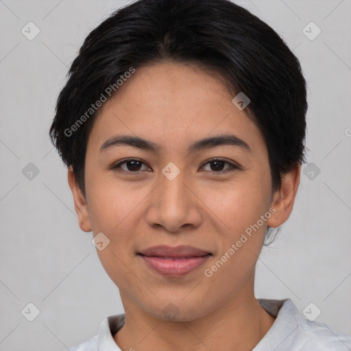 Joyful asian young-adult female with short  black hair and brown eyes