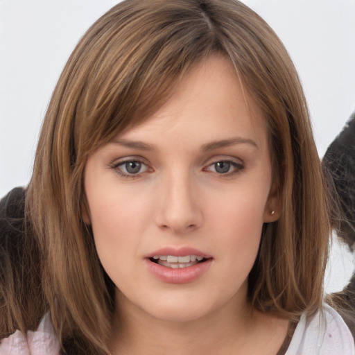 Neutral white young-adult female with medium  brown hair and brown eyes