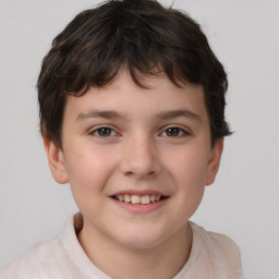 Joyful white child male with short  brown hair and brown eyes