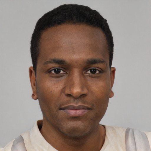 Neutral black young-adult male with short  black hair and brown eyes
