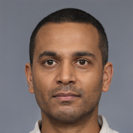 Neutral black young-adult male with short  black hair and brown eyes