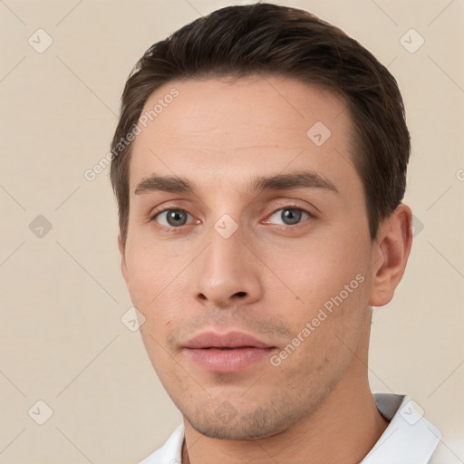 Neutral white young-adult male with short  brown hair and brown eyes