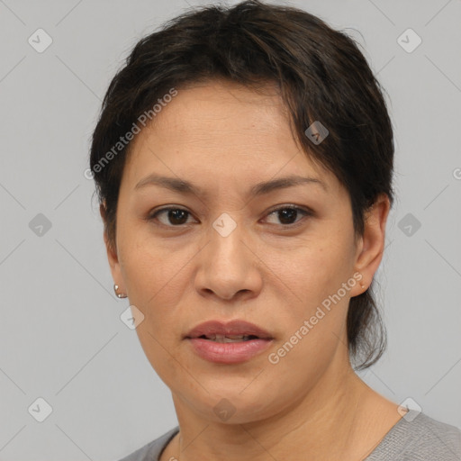 Joyful white adult female with short  brown hair and brown eyes