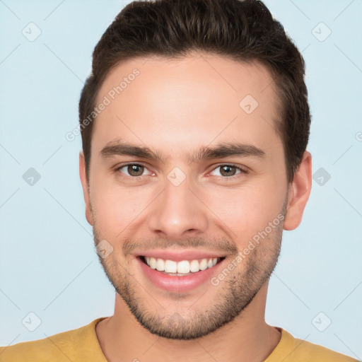 Joyful white young-adult male with short  brown hair and brown eyes