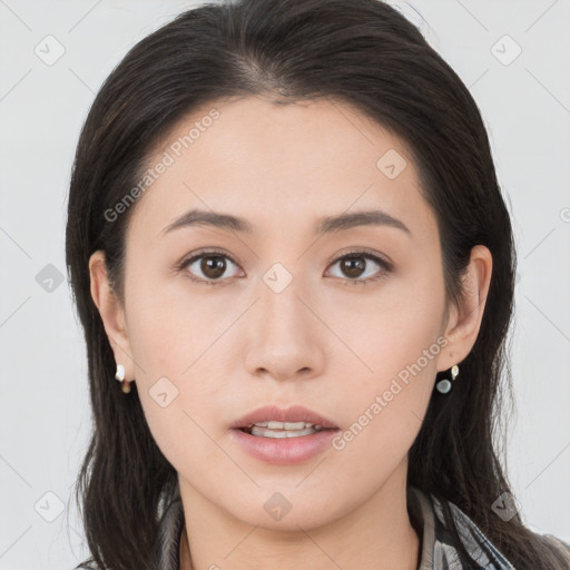 Neutral white young-adult female with long  brown hair and brown eyes