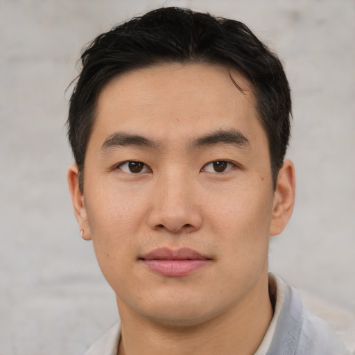 Neutral asian young-adult male with short  brown hair and brown eyes